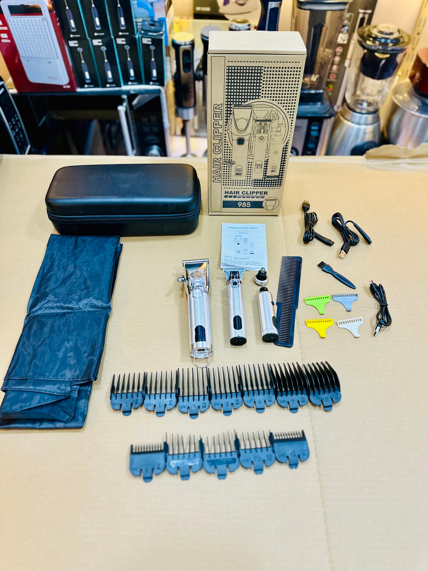 Model 985 Premium 3-in-1 Metal Shaver & Trimmer Kit with Smart LED Display and Hard Case.